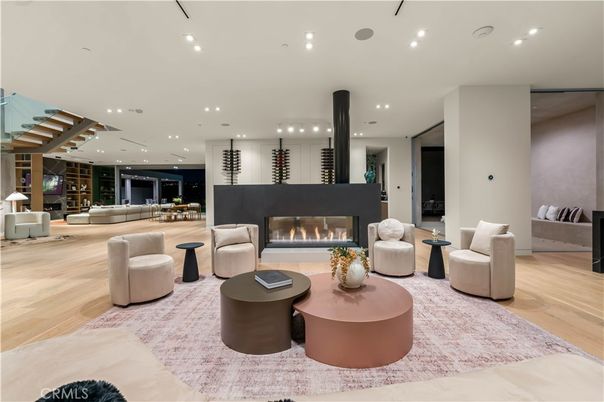 Dining room, Fireplace, Interior, Living room, Recessed Lighting, Wood Texture Flooring