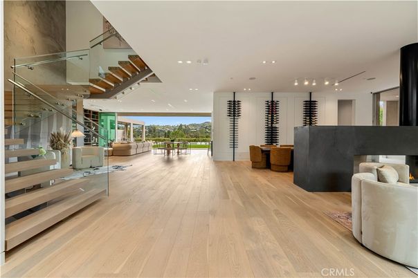 Dining room, Fireplace, Interior, Living room, Recessed Lighting, Wood Texture Flooring