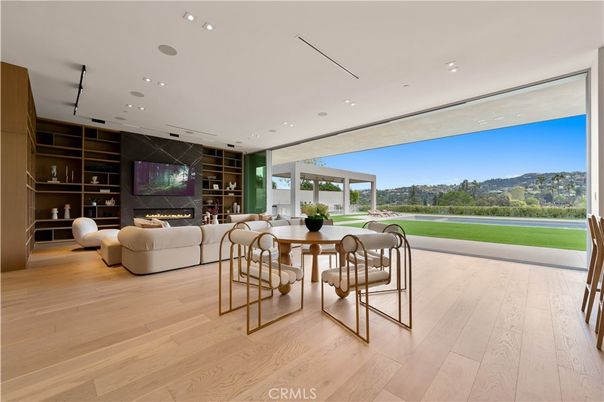 Dining room, Fireplace, Interior, Living room, Recessed Lighting, Wood Texture Flooring