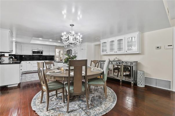 Chandelier, Dining room, Interior, Kitchen, Recessed Lighting, Stainless Steel Appliances, Wood Texture Flooring