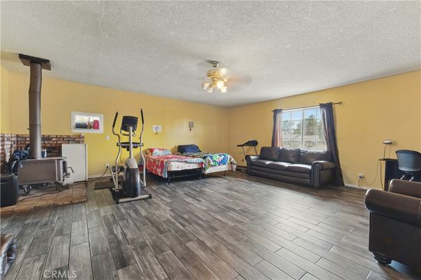 Bedroom, Fireplace, Fitness Equipment, Interior, Wood Texture Flooring
