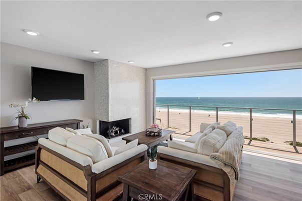 Fireplace, Interior, Living room, Recessed Lighting, Water, Wood Texture Flooring