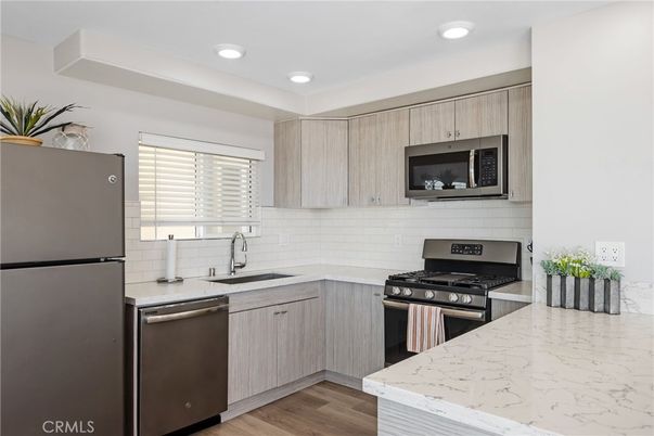 Interior, Kitchen, Recessed Lighting, Stainless Steel Appliances, Wood Texture Flooring