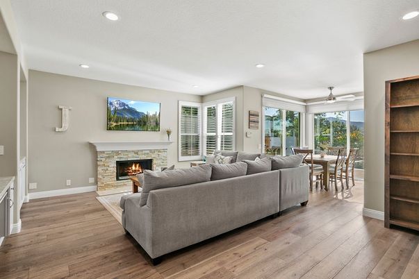 Dining room, Fireplace, Interior, Living room, Recessed Lighting, Wood Texture Flooring