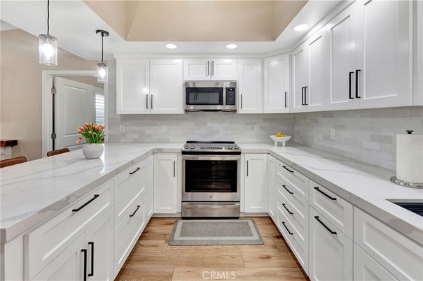 Interior, Kitchen, Pendant Lights, Recessed Lighting, Stainless Steel Appliances, Wood Texture Flooring