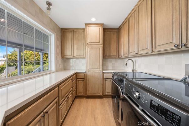 Interior, Kitchen, Recessed Lighting, Tile Countertops, Wood Texture Flooring