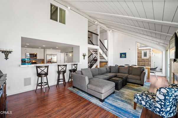 Fireplace, Interior, Kitchen, Living room, Recessed Lighting, Stainless Steel Appliances, Wood Texture Flooring