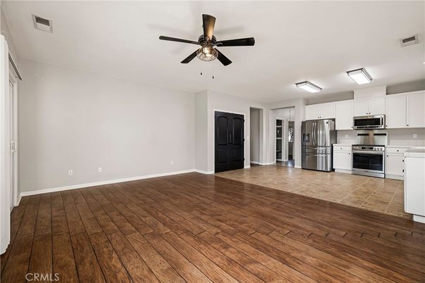 Empty room, Interior, Kitchen, Stainless Steel Appliances, Wood Texture Flooring