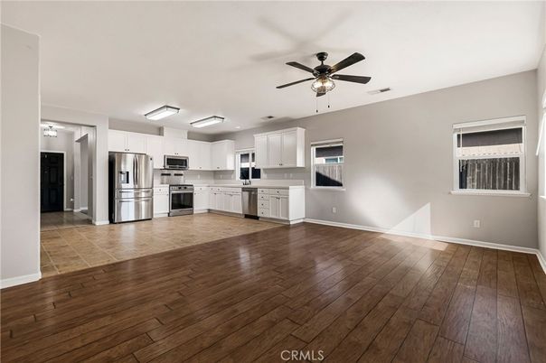 Empty room, Interior, Kitchen, Stainless Steel Appliances, Wood Texture Flooring