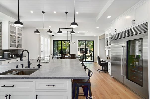 Dining room, Interior, Kitchen, Pendant Lights, Recessed Lighting, Stainless Steel Appliances, Wood Texture Flooring
