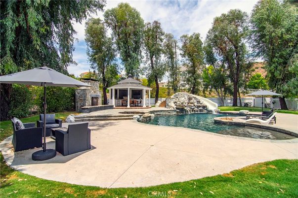 Exterior, Fireplace, Pool