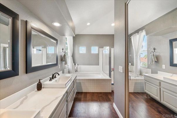Bathroom, Dual Sink Vanities, Interior, Recessed Lighting, Wood Texture Flooring