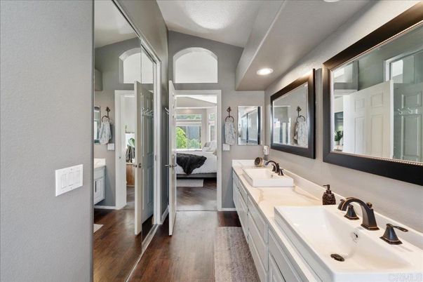 Bathroom, Dual Sink Vanities, Interior, Recessed Lighting, Wood Texture Flooring