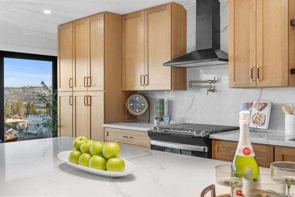 Interior, Kitchen, Marble Walls, Recessed Lighting, Stainless Steel Appliances