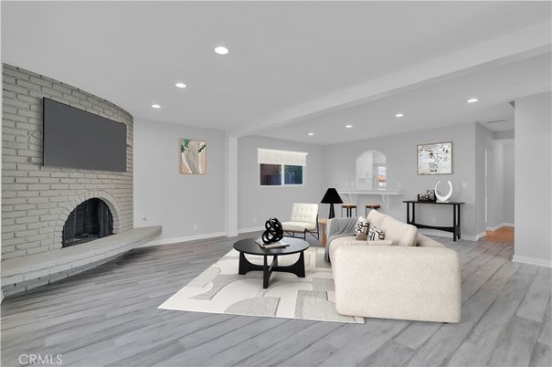 Fireplace, Interior, Living room, Piano, Recessed Lighting, Stone Walls, Wood Texture Flooring