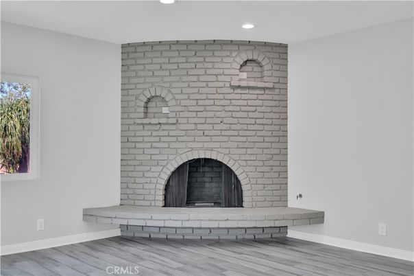 Fireplace, Interior, Recessed Lighting, Stone Walls, Wood Texture Flooring