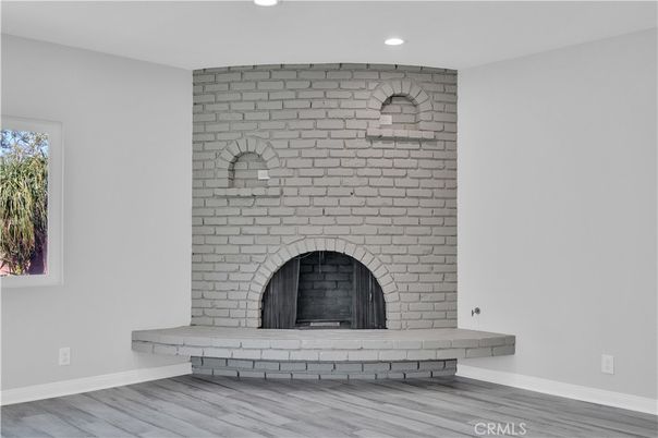 Fireplace, Interior, Recessed Lighting, Stone Walls, Wood Texture Flooring