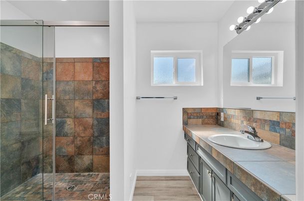 Bathroom, Glass Shower, Interior, Tile Countertops, Wood Texture Flooring