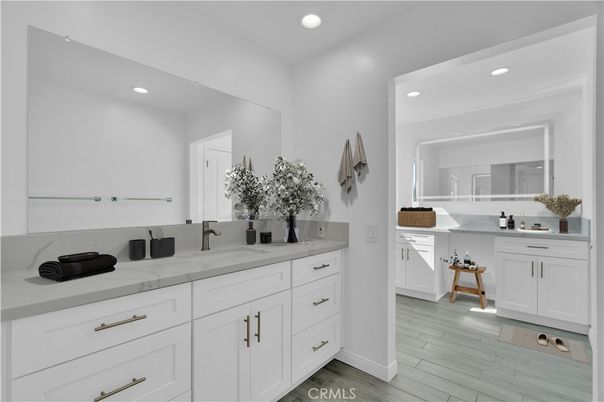 Bathroom, Dual Sink Vanities, Interior, Recessed Lighting, Wood Texture Flooring