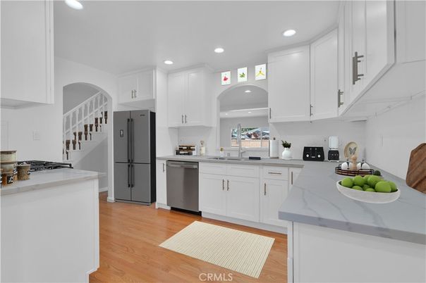 Interior, Kitchen, Recessed Lighting, Stainless Steel Appliances, Wood Texture Flooring