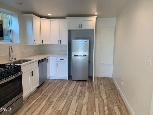 Interior, Kitchen, Recessed Lighting, Stainless Steel Appliances, Wood Texture Flooring