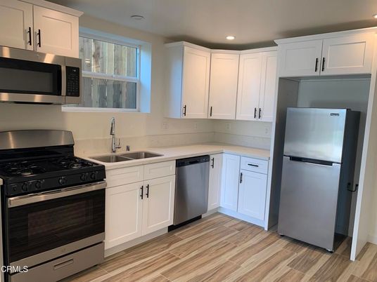 Interior, Kitchen, Recessed Lighting, Stainless Steel Appliances, Wood Texture Flooring