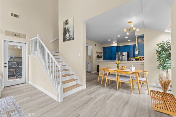 Dining room, Interior, Kitchen, Pendant Lights, Recessed Lighting, Stainless Steel Appliances, Wood Texture Flooring