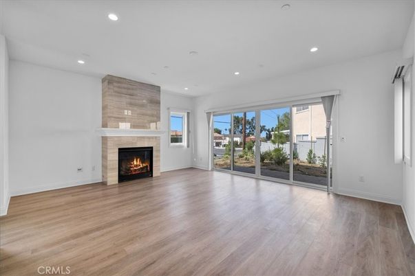 Empty room, Fireplace, Interior, Recessed Lighting, Wood Texture Flooring