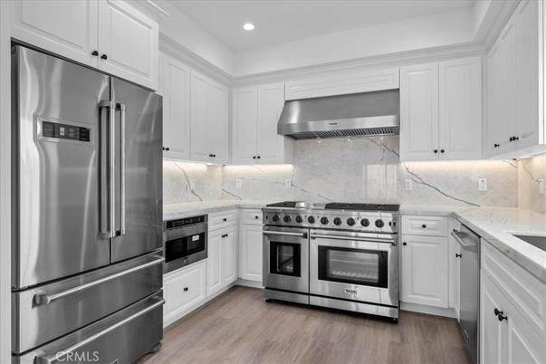 Interior, Kitchen, Recessed Lighting, Stainless Steel Appliances, Wood Texture Flooring