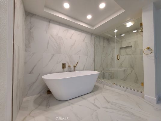 Bathroom, Free Standing Baths, Glass Shower, Interior, Marble, Marble Walls, Recessed Lighting