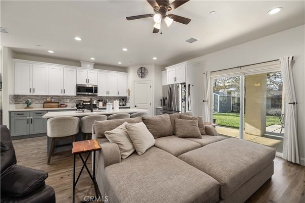 Dining room, Interior, Kitchen, Living room, Recessed Lighting, Stainless Steel Appliances, Wood Texture Flooring