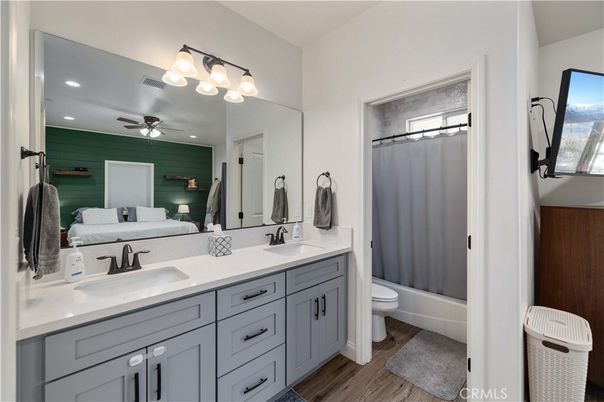 Bathroom, Bedroom, Dual Sink Vanities, Interior, Recessed Lighting, Wood Texture Flooring