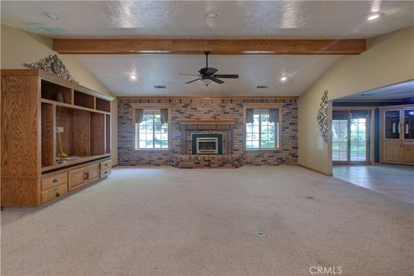 Empty room, Fireplace, Interior, Recessed Lighting, Stone Walls, Wooden Beams