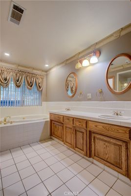 Bathroom, Dual Sink Vanities, Interior, Recessed Lighting, Tile Countertops