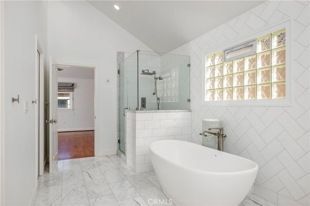 Bathroom, Free Standing Baths, Glass Shower, Interior, Marble, Recessed Lighting, Wood Texture Flooring