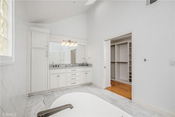 Bathroom, Dual Sink Vanities, Interior, Marble, Walk-in Closets, Wood Texture Flooring