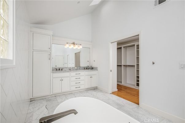 Bathroom, Dual Sink Vanities, Interior, Marble, Walk-in Closets, Wood Texture Flooring