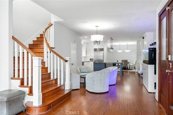 Dining room, Interior, Kitchen, Living room, Pendant Lights, Recessed Lighting, Stainless Steel Appliances, Wood Texture Flooring
