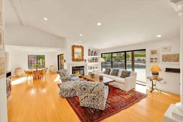 Dining room, Fireplace, Interior, Living room, Recessed Lighting, Wood Texture Flooring