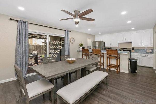 Dining room, Interior, Kitchen, Recessed Lighting, Stainless Steel Appliances, Wood Texture Flooring