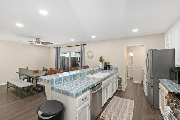 Dining room, Interior, Kitchen, Recessed Lighting, Tile Countertops, Wood Texture Flooring
