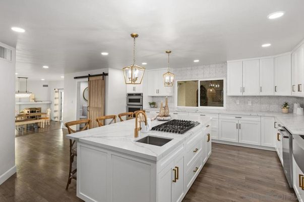 Dining room, Interior, Kitchen, Pendant Lights, Recessed Lighting, Stainless Steel Appliances, Wood Texture Flooring