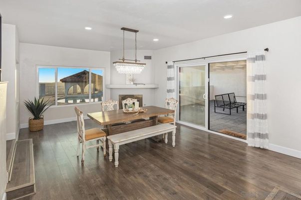 Chandelier, Dining room, Fireplace, Interior, Pendant Lights, Recessed Lighting, Wood Texture Flooring