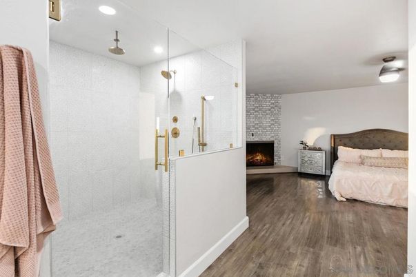 Bedroom, Fireplace, Interior, Recessed Lighting, Wood Texture Flooring