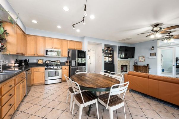 Dining room, Fireplace, Interior, Kitchen, Pendant Lights, Recessed Lighting, Stainless Steel Appliances
