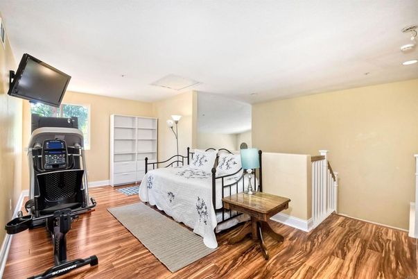 Bedroom, Fitness Equipment, Interior, Recessed Lighting, Wood Texture Flooring