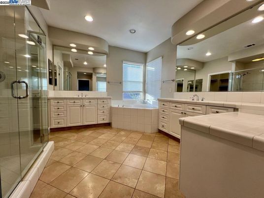 Bathroom, Dual Sink Vanities, Glass Shower, Interior, Recessed Lighting, Tile Countertops