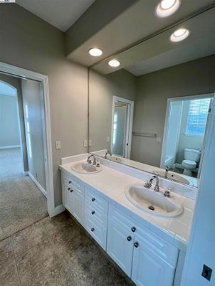 Bathroom, Dual Sink Vanities, Interior, Recessed Lighting, Tile Countertops
