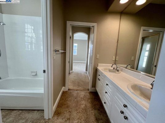 Bathroom, Dual Sink Vanities, Interior, Recessed Lighting, Tile Countertops