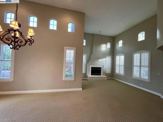 Chandelier, Empty room, Fireplace, Interior